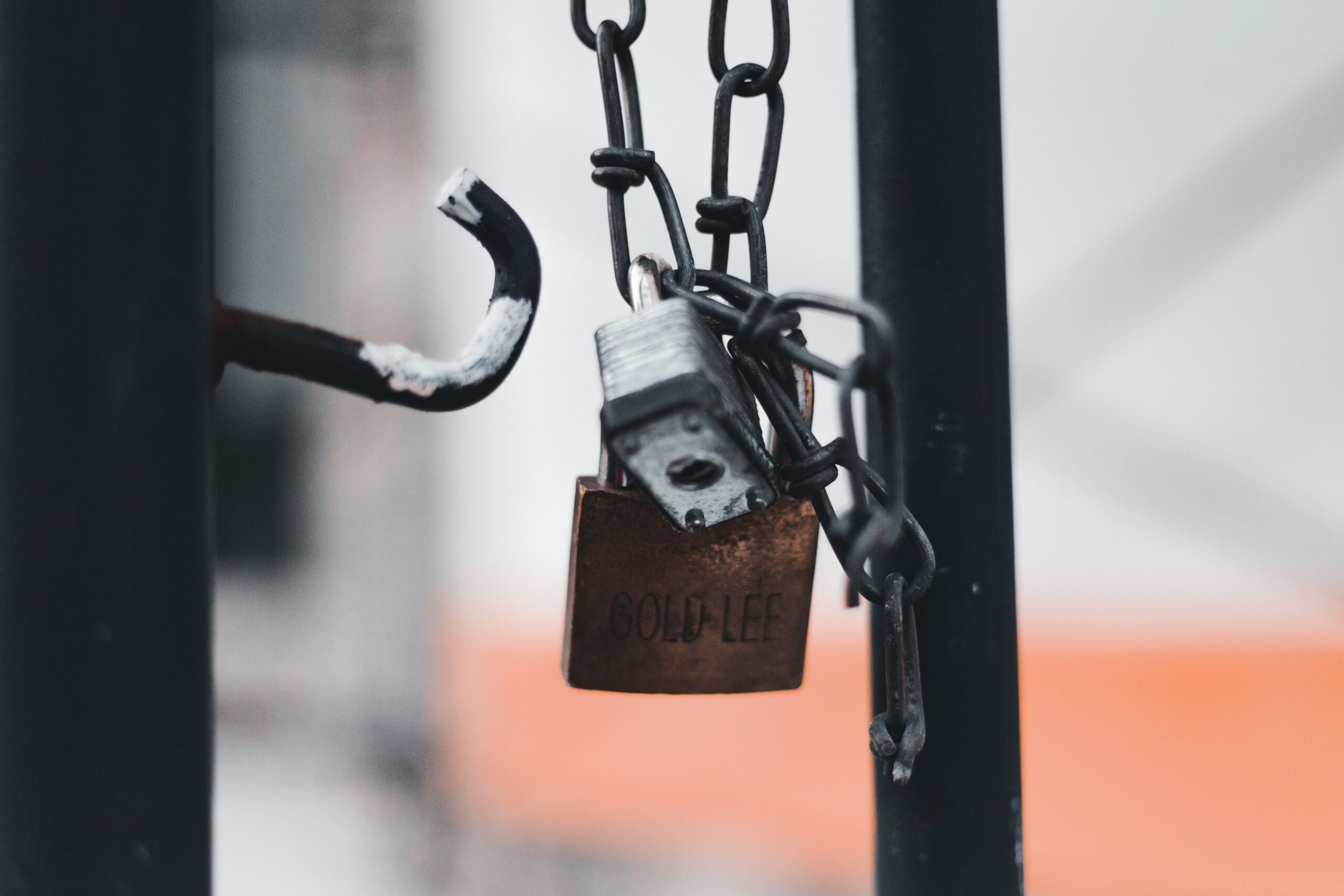 What is negligent security — a padlock and chain securing a property gate
